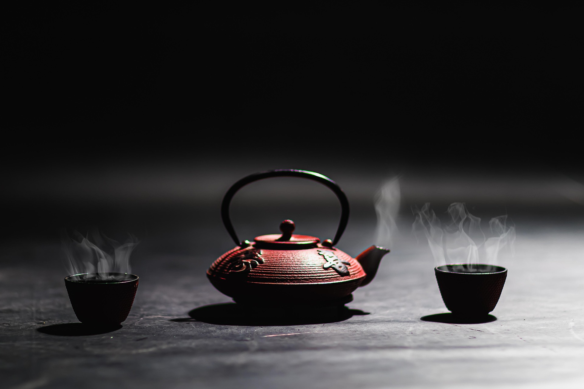 Cast iron teapot with steam